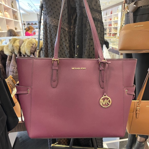 Michael Kors Gilly Large Drawstring Travel Leather Top Zip Tote 
Oxblood Color - Picture 3 of 16